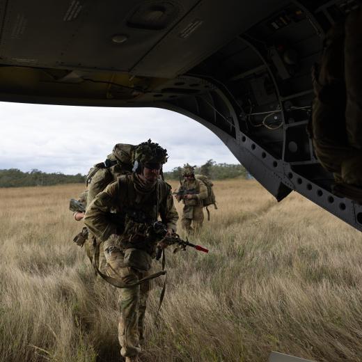 Soldiers from 4th Regiment Royal Australian Artillery embark a CH-47F Chinook 