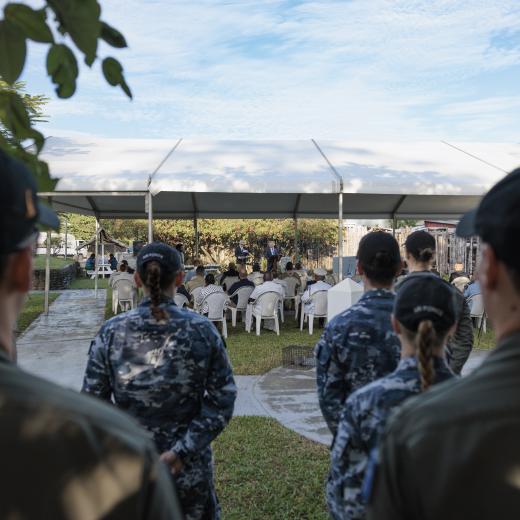No. 35 Squadron watch the speeches during the HMAS Canberra I Memorial.